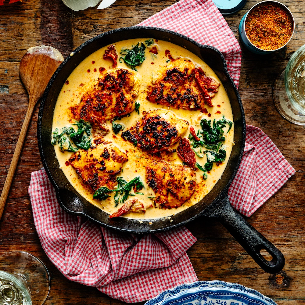 Pollo a la parmesana con espinacas